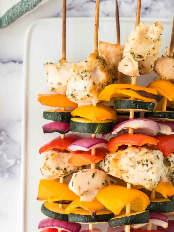 chicken kabobs with skewered chicken zucchini onion and peppers