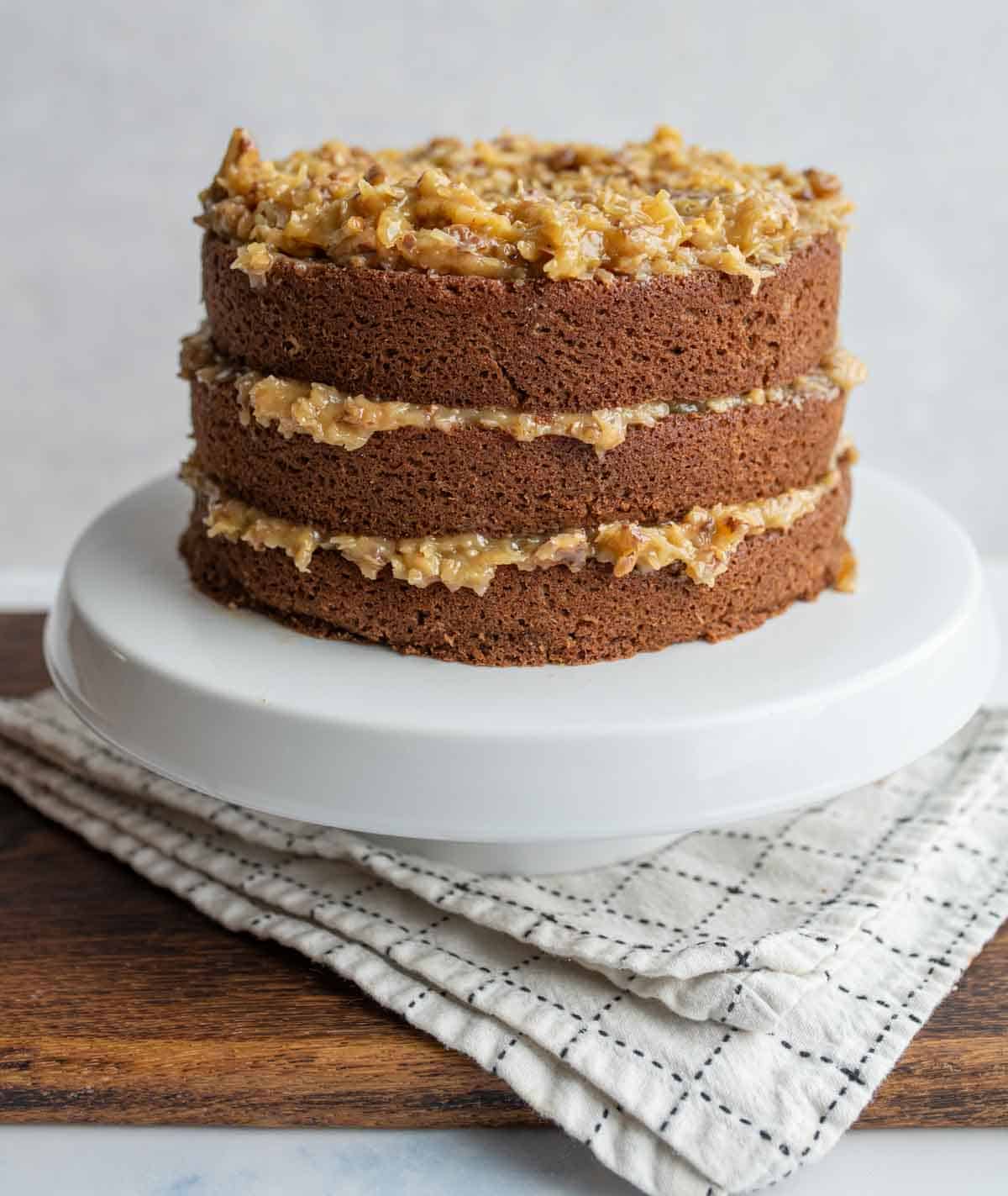 three layered round german chocolate cake with traditional coconut frosting