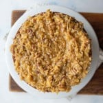 three layered round german chocolate cake with traditional coconut frosting top view whole