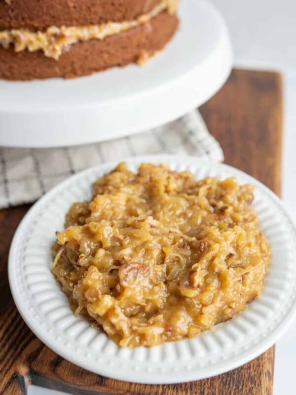 traditional coconut icing for german chocolate cake on a white plate