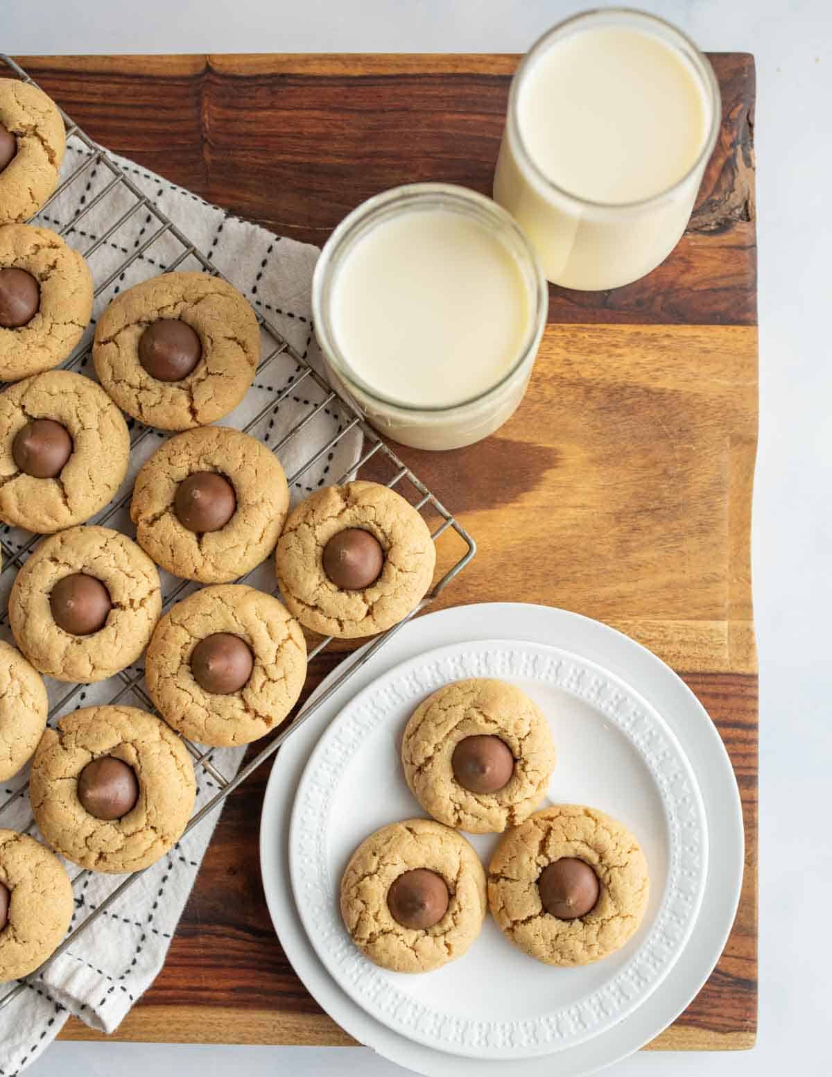 hershey kisses cookies in rows on a baking dish and on a white plate