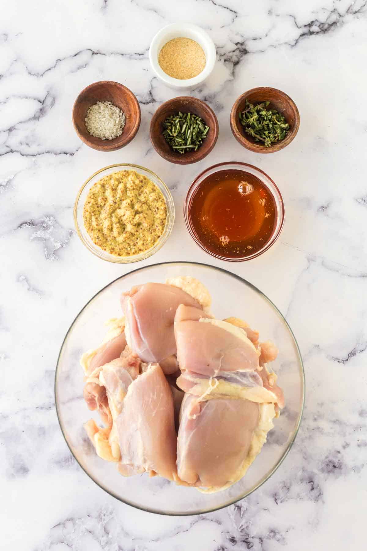 raw ingredients for honey mustard chicken recipe portioned