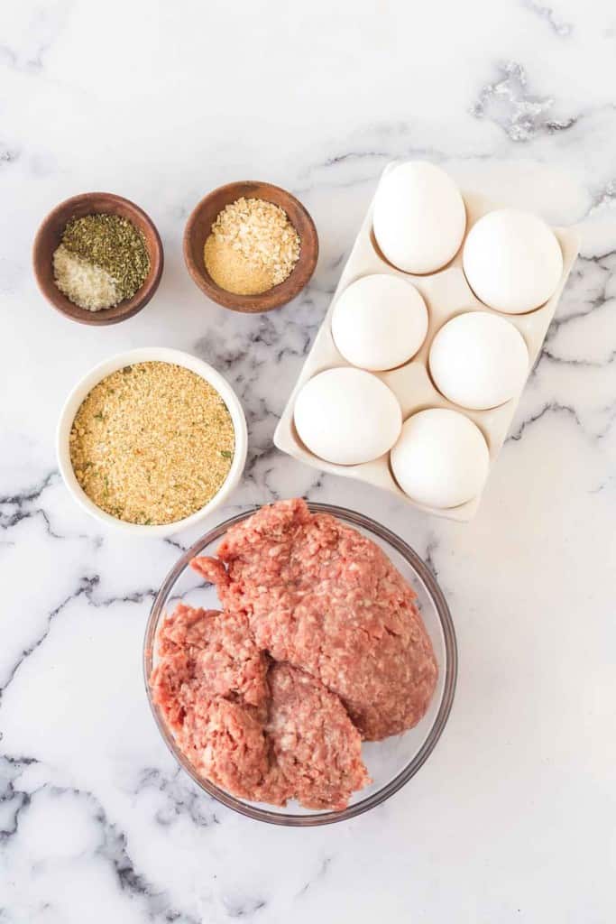 Italian meatball ingredients in portion dishes