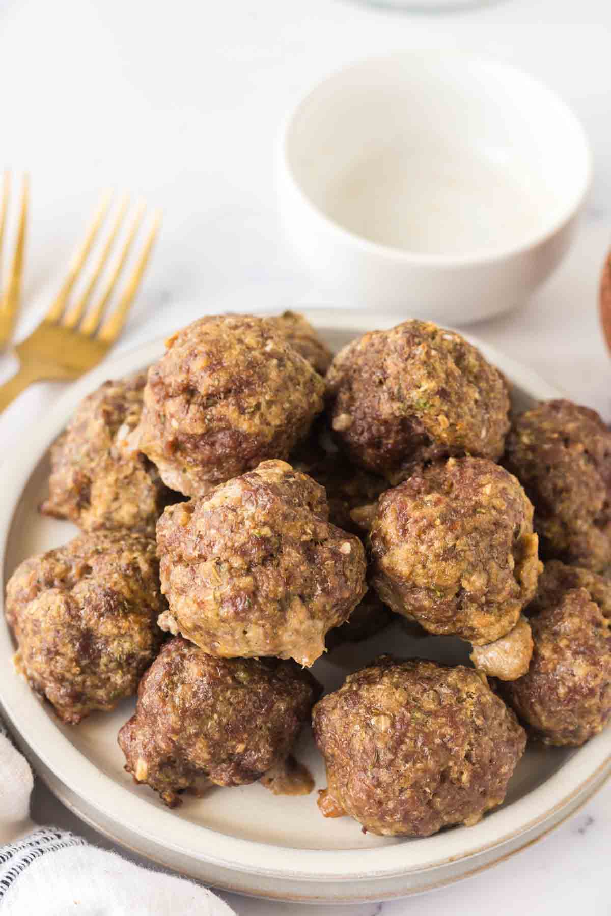 Italian meatballs in a stack on a plate