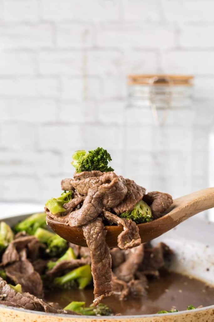 Spoonful of beef and broccoli stirfry. 