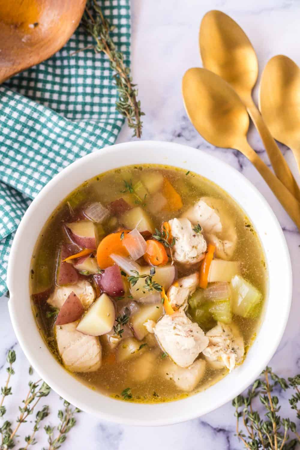 Top view of a bowl of chicken stew.