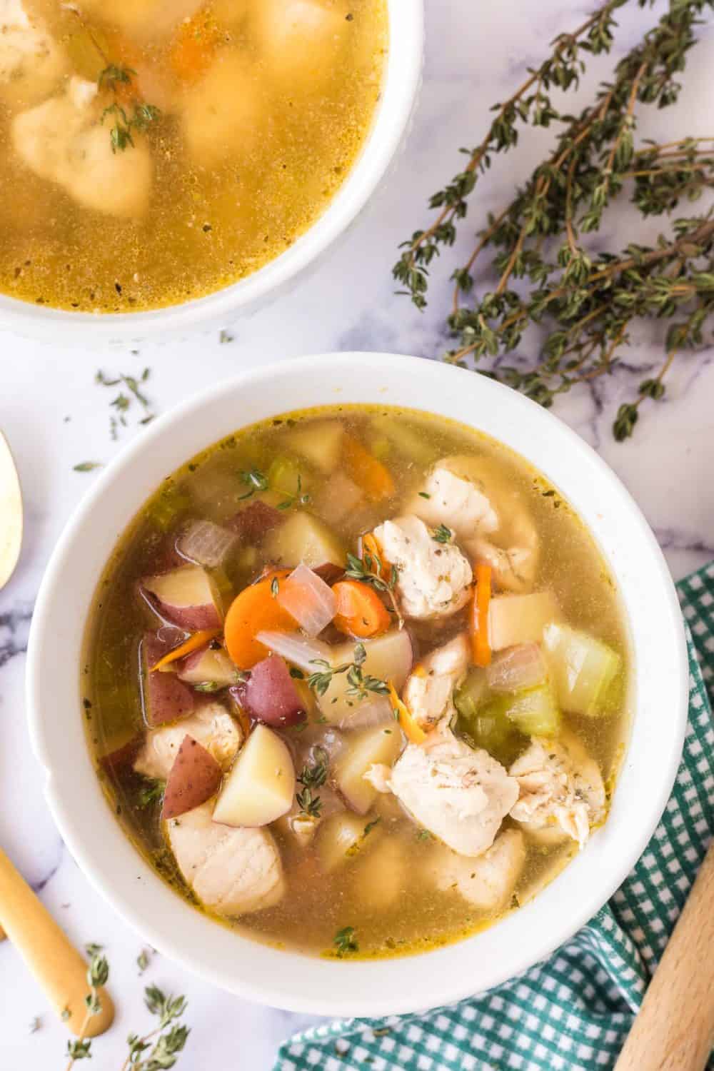 Colorful chicken stew in a bowl.