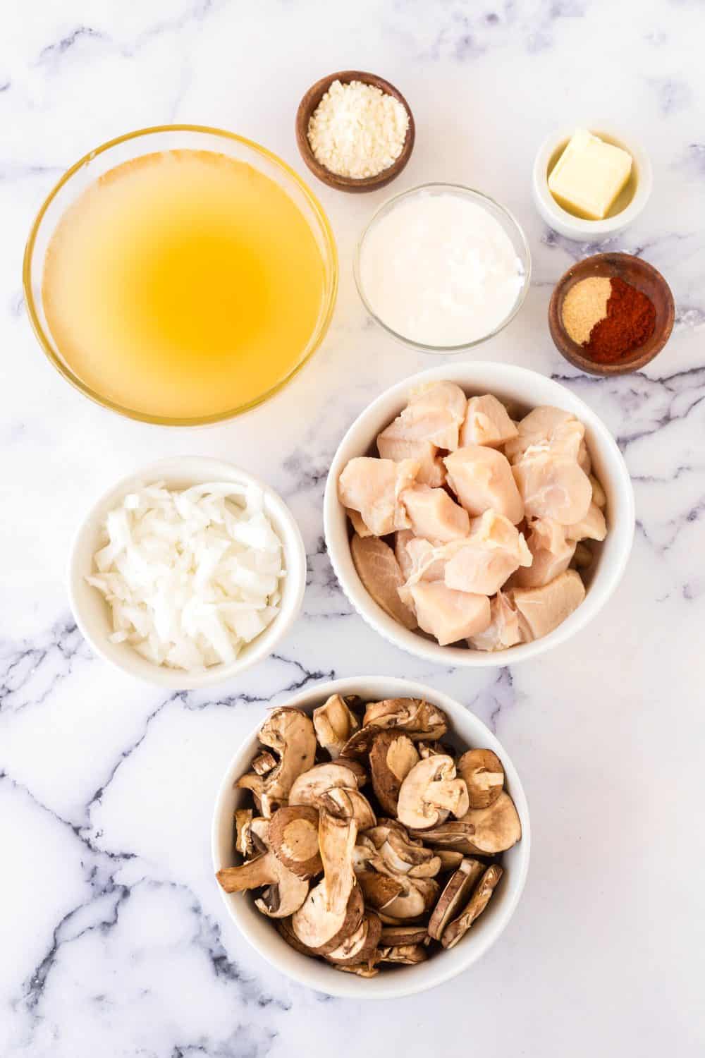 raw and portioned chicken stroganoff ingredients