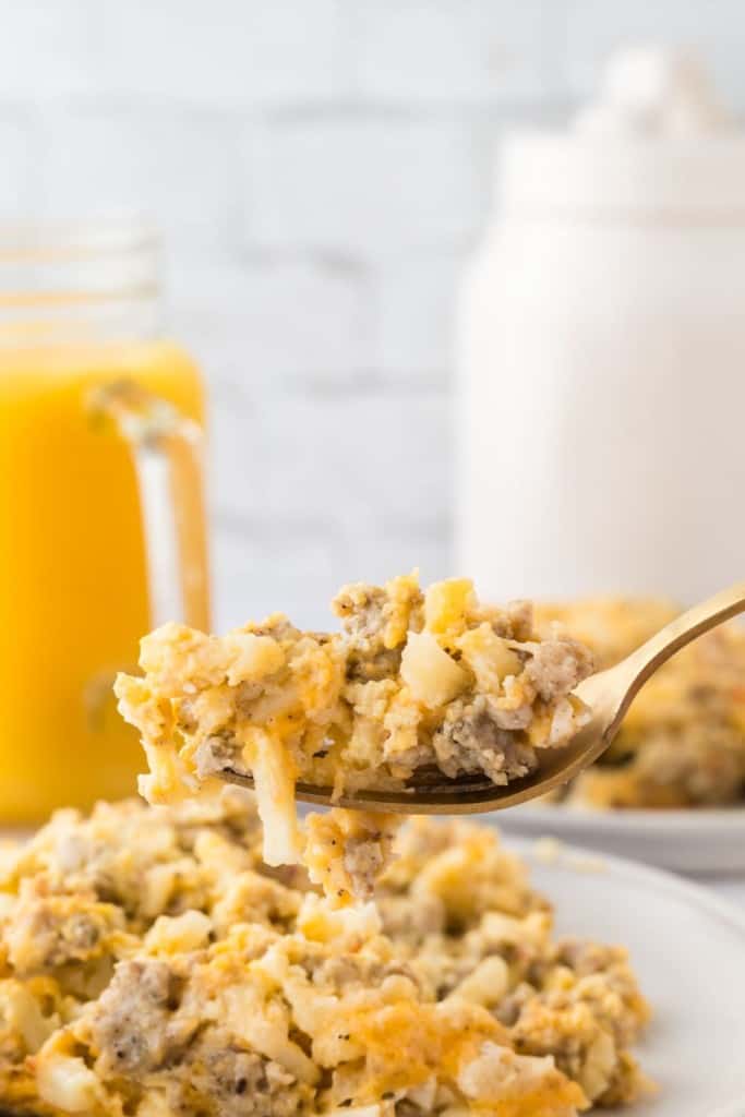 Spoonful of crockpot breakfast casserole.