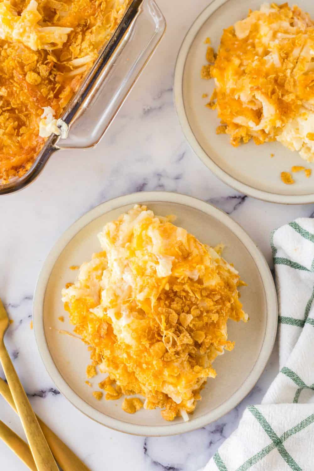 Top view of funeral potatoes on a plate.