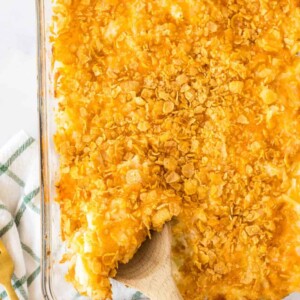 an entire baking dish full of crispy golden funeral potatoes