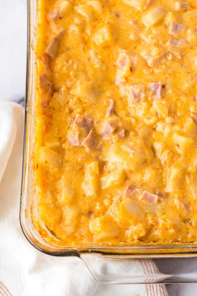 a baking dish of of ham and potato casserole