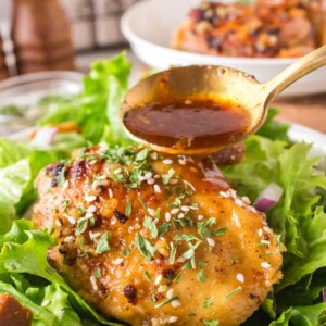 honey garlic chicken thighs over lettuce