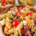 Italian pasta salad in a wooden bowl