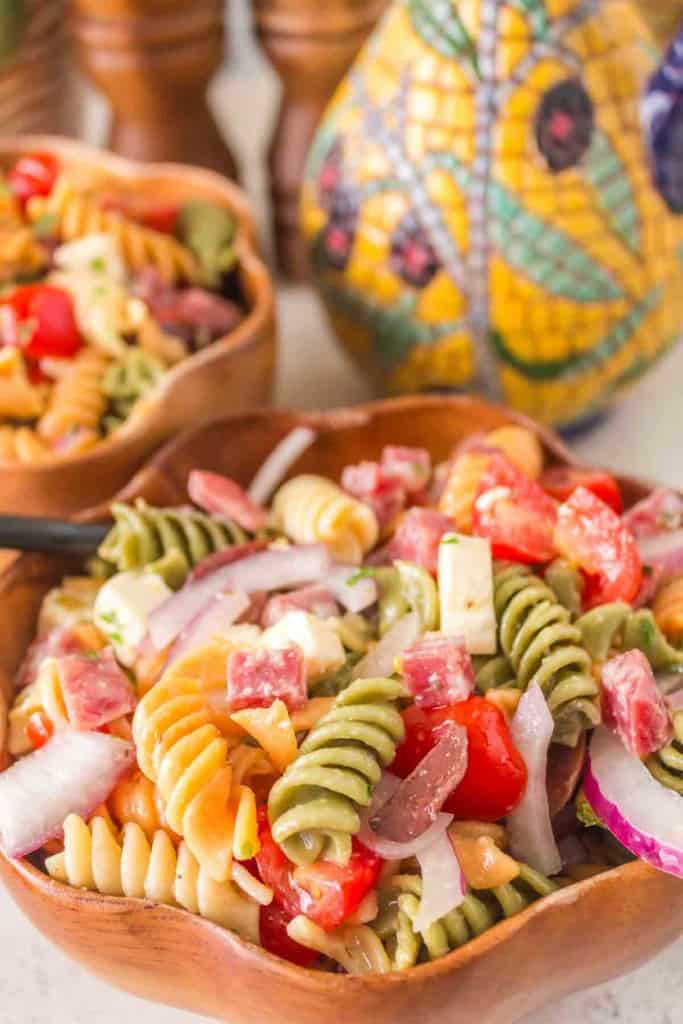 Italian pasta salad in a wooden bowl