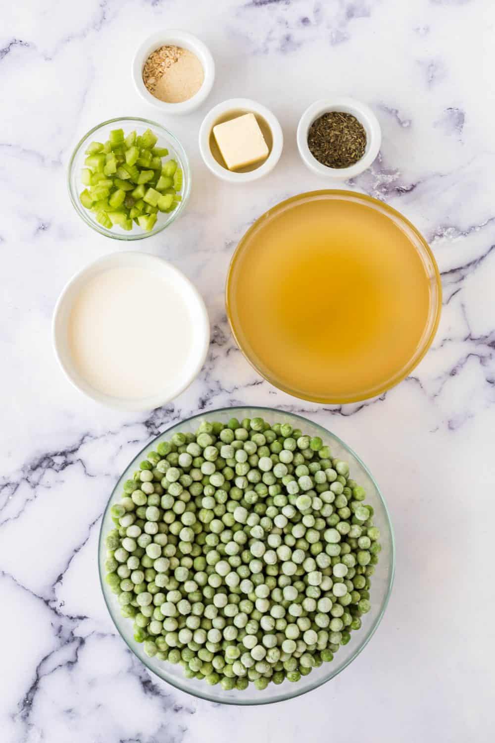 portion bowls of raw pea soup ingredients
