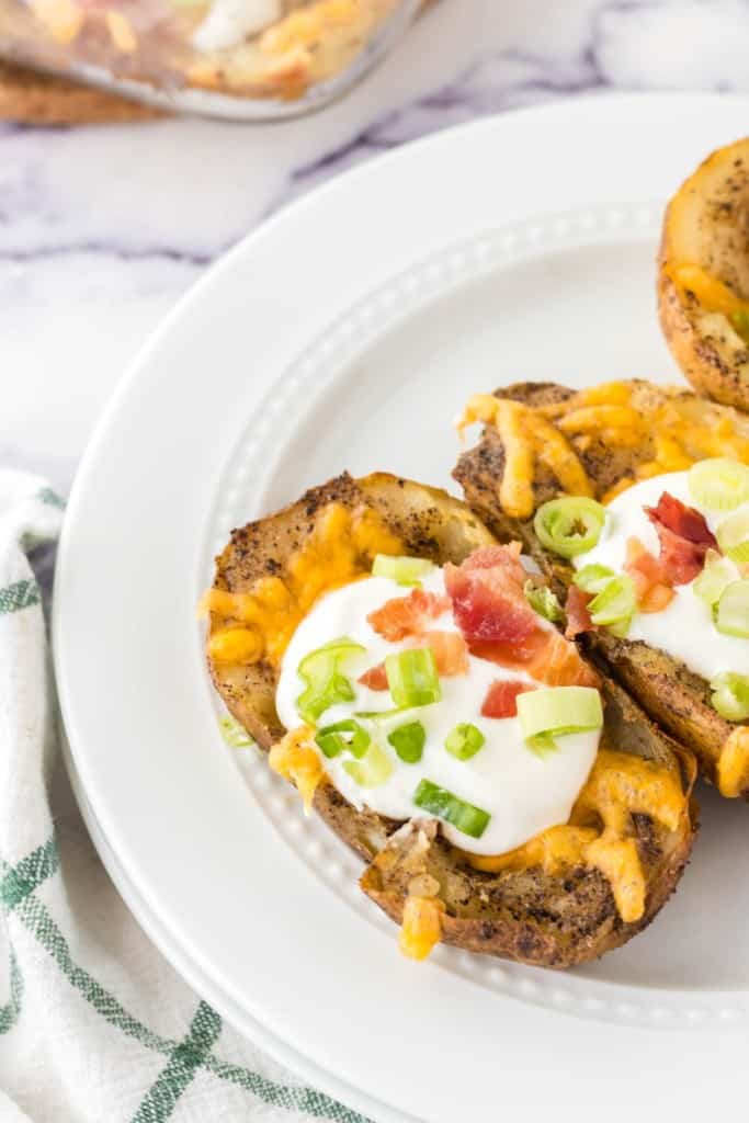 round plate with baked potato skins
