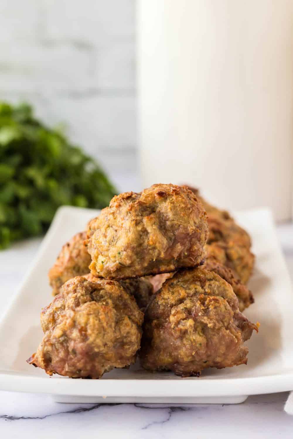 long plate with a baked stack of turkey meatballs