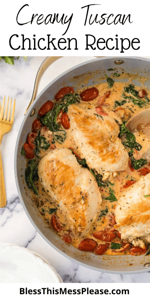 Creamy tuscan chicken in a pan with text