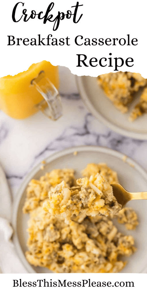 Fork full of crockpot breakfast casserole with orange juice