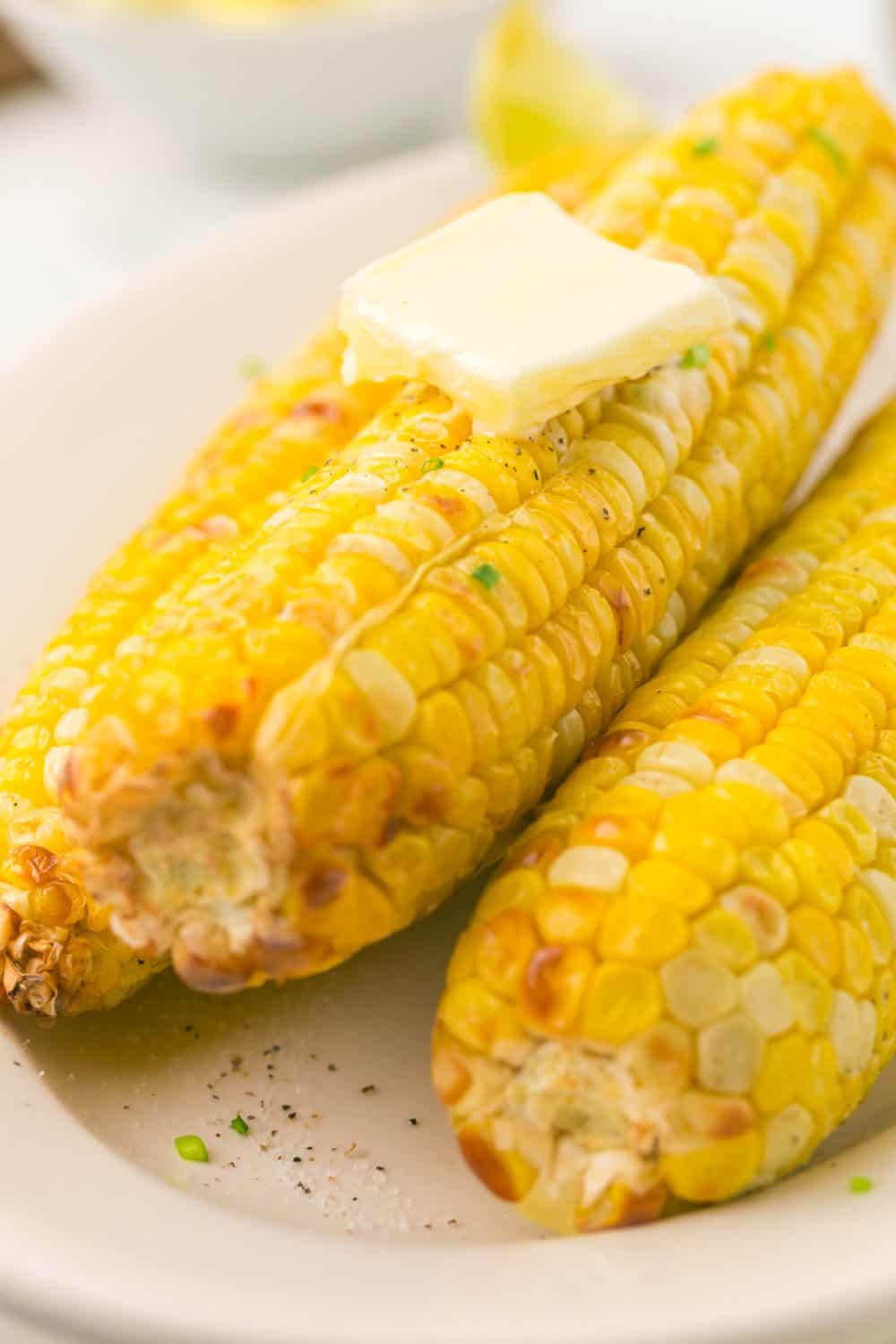 air fryer corn on the cob on a plate