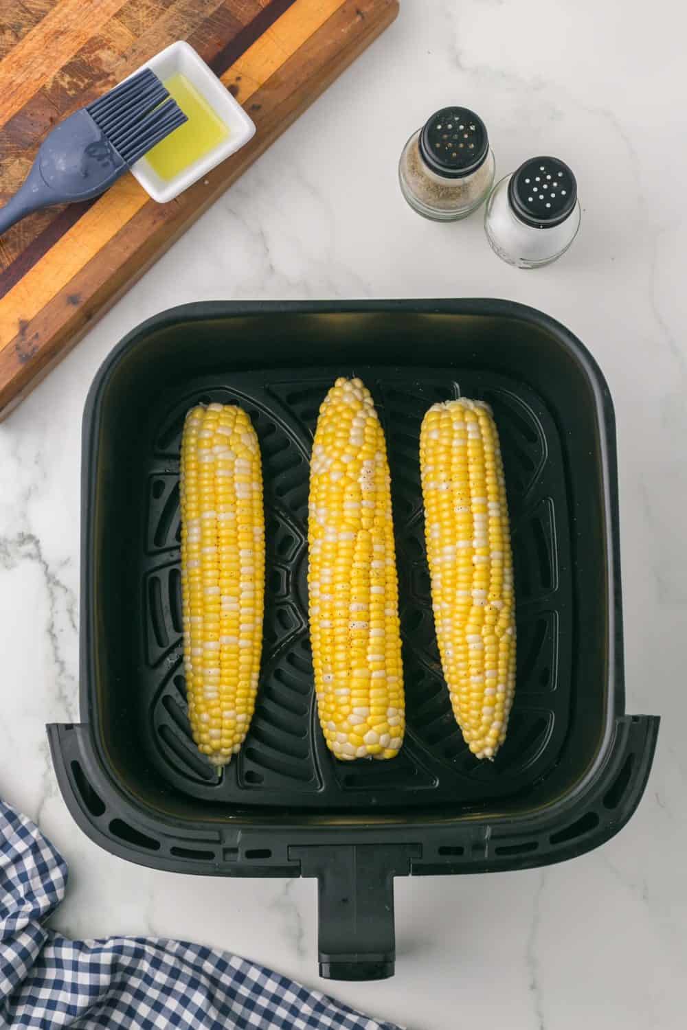 raw corn in the air fryer basket