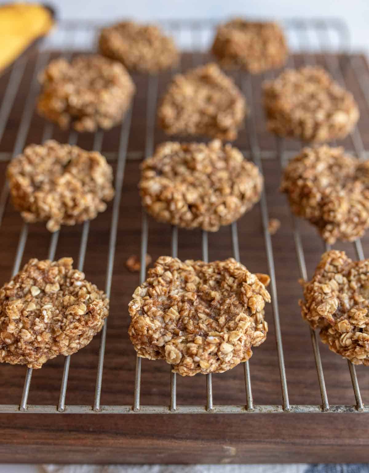 banana oatmeal cookies in rows on a drying rack