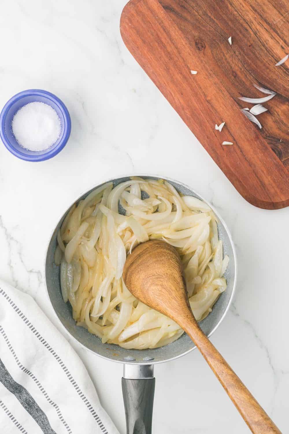 caramelizing onions step by step in a pot