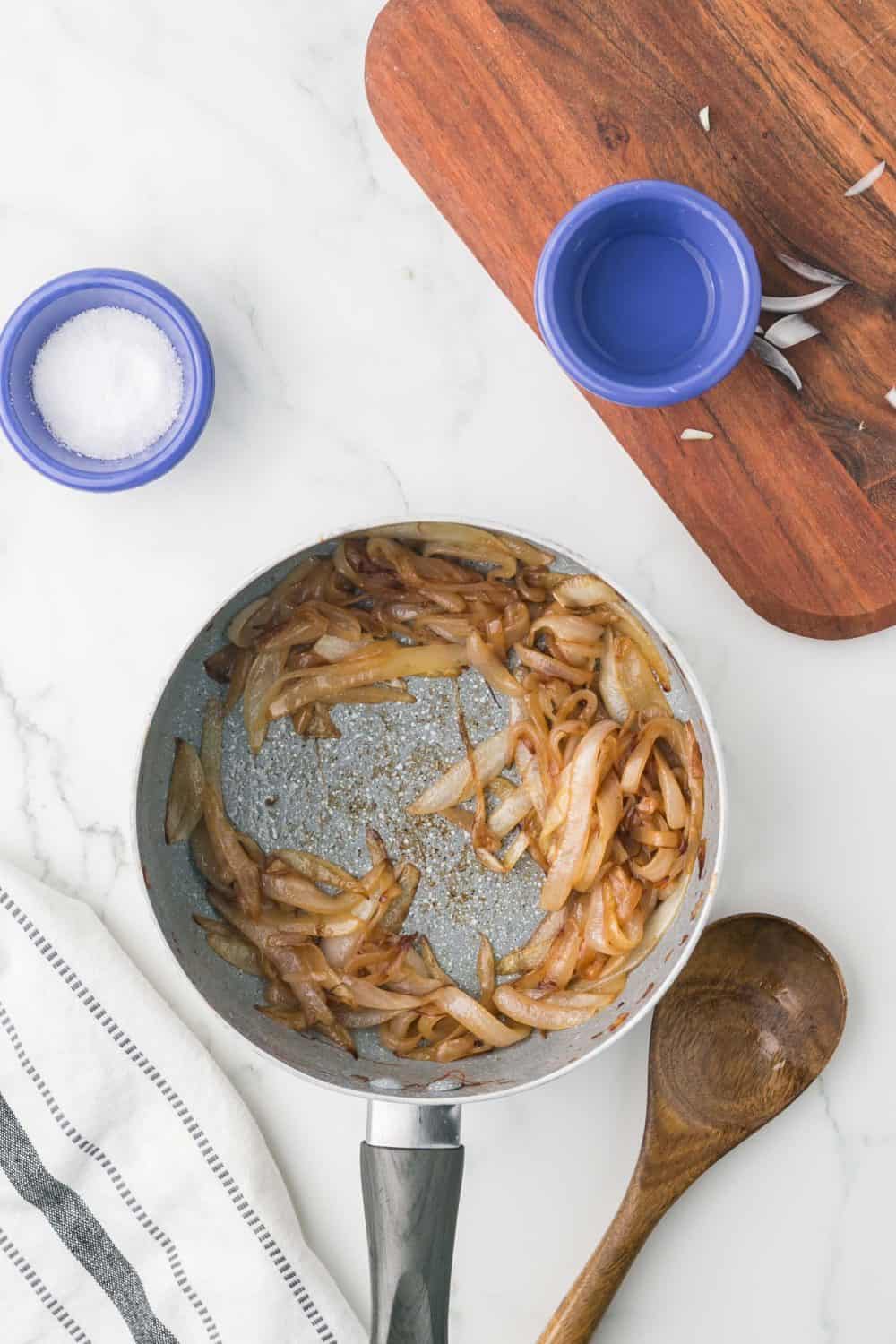 caramelizing onions step by step in a pot