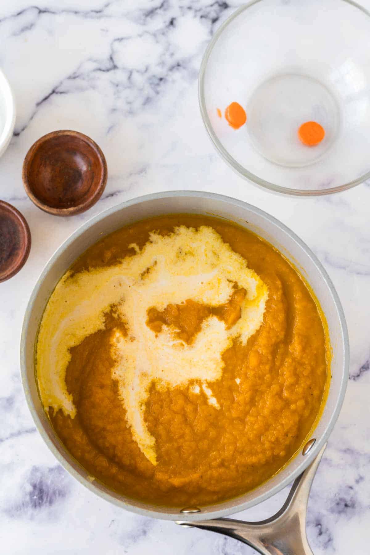 carrot soup cooking in a pot