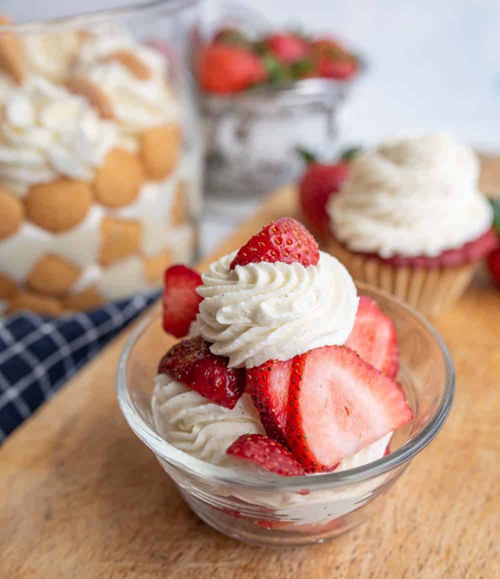 Strawberries topped with chantilly cream .
