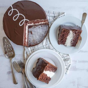 top aesthetic view of a ding dong cake and triangle slices served on plates