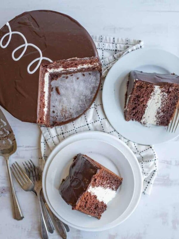 top aesthetic view of a ding dong cake and triangle slices served on plates