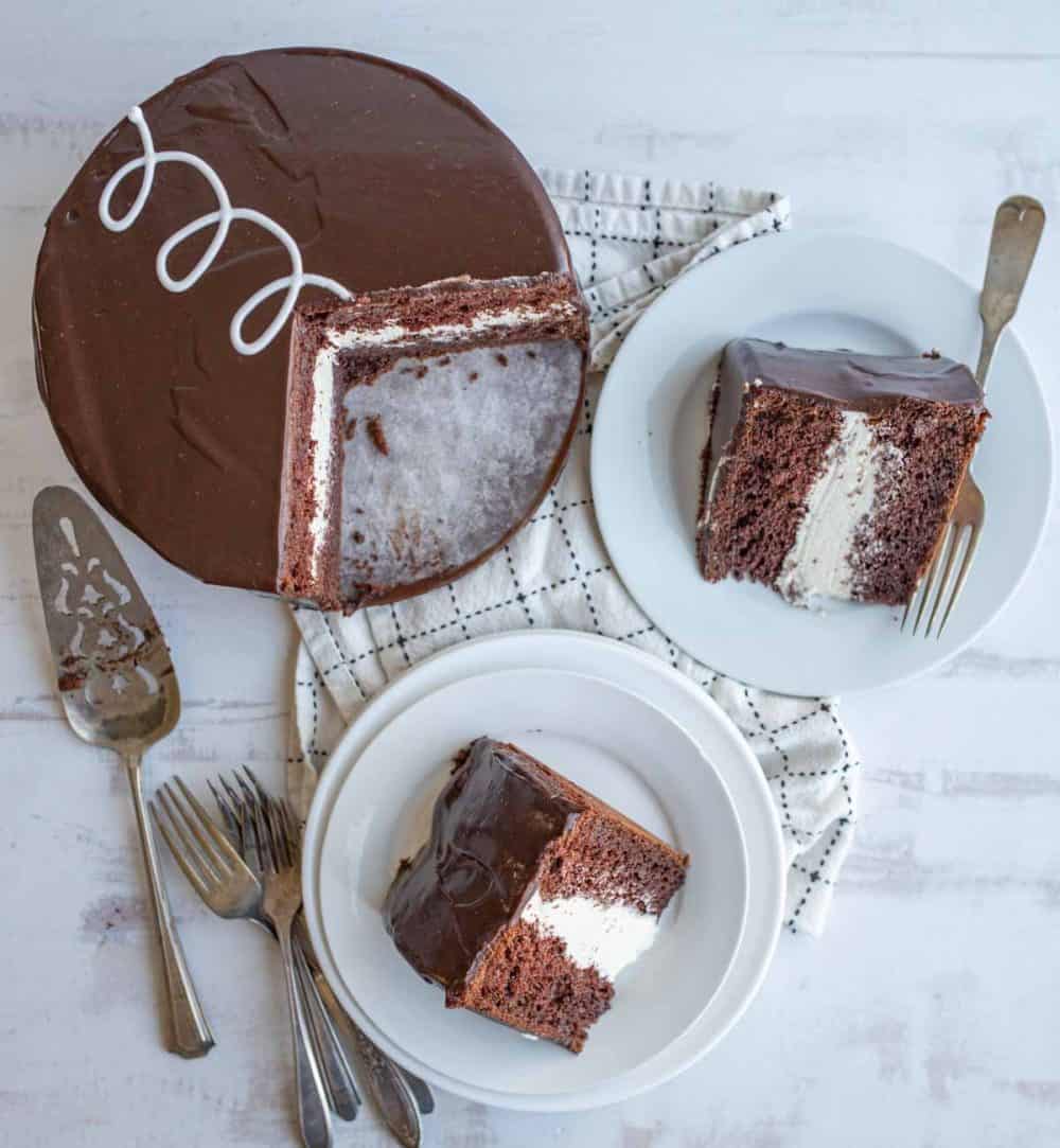 top aesthetic view of a ding dong cake and triangle slices served on plates