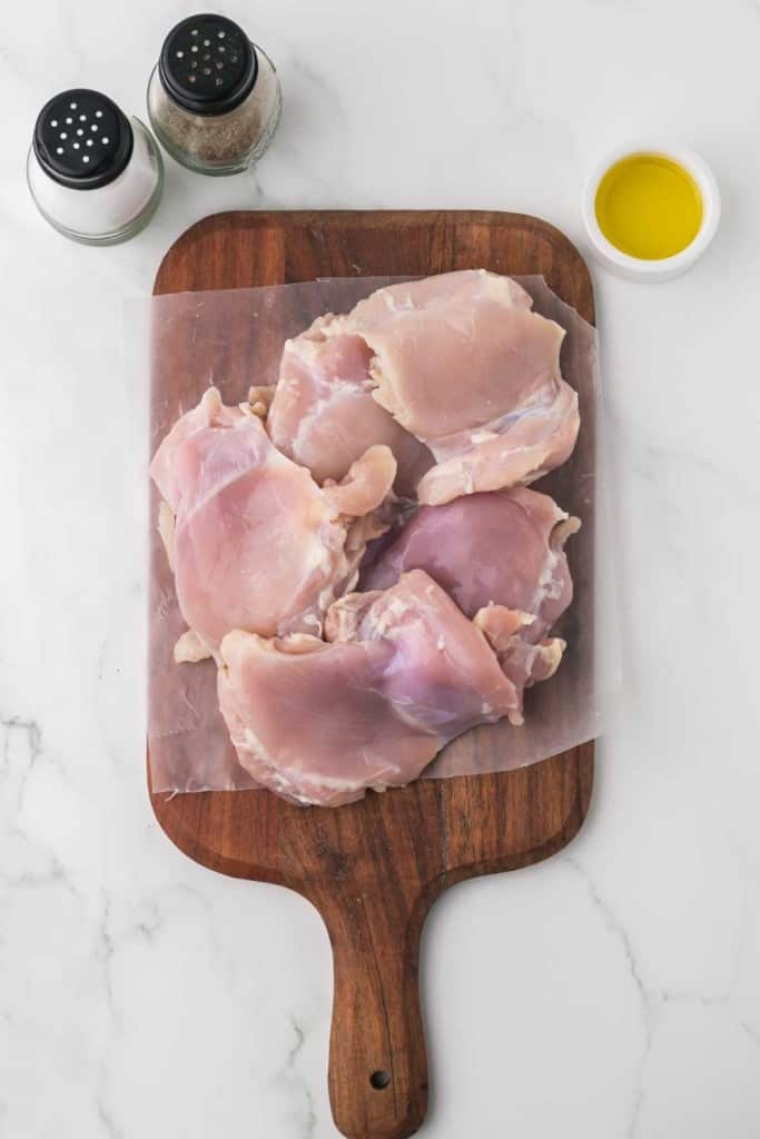 raw chicken soon to be shredded