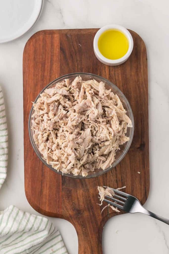 shredded chicken in a clear bowl