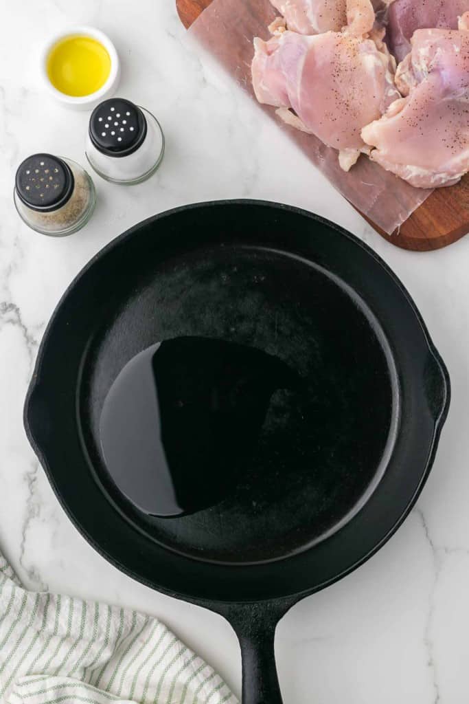 oil in a cast iron pan for shredded chicken recipe