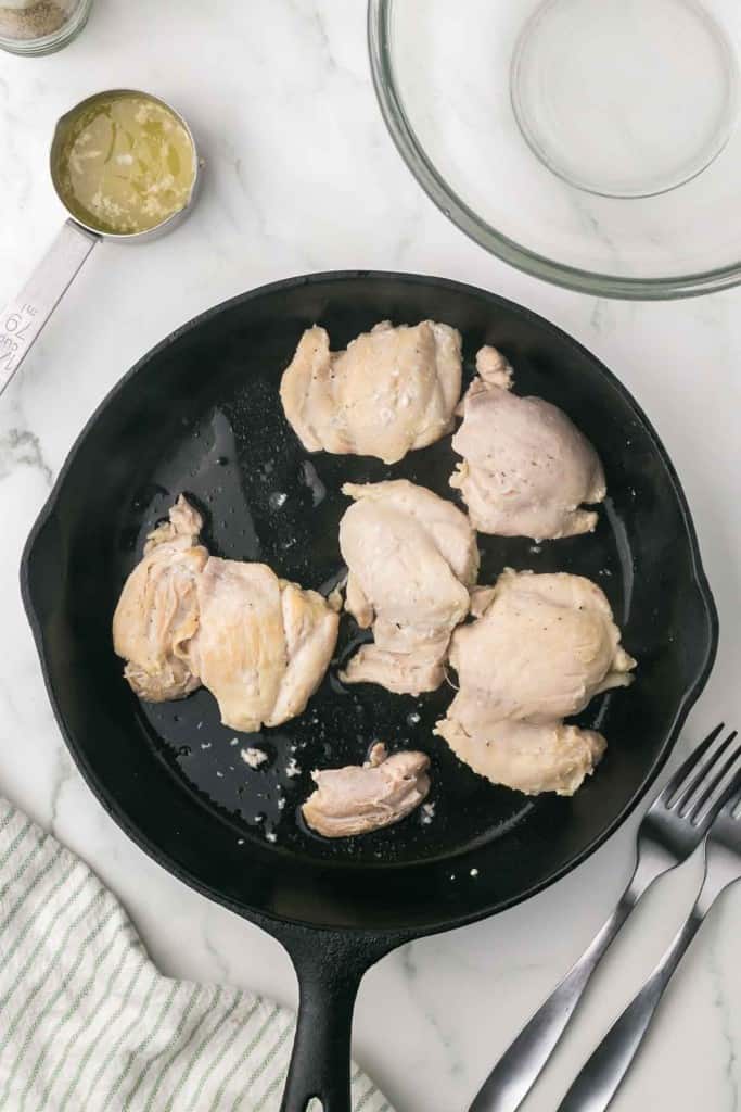 chicken cooked in a cast iron pan