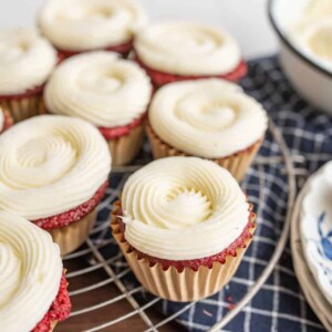 red velvet cupcakes with piped iced cream cheese frosting