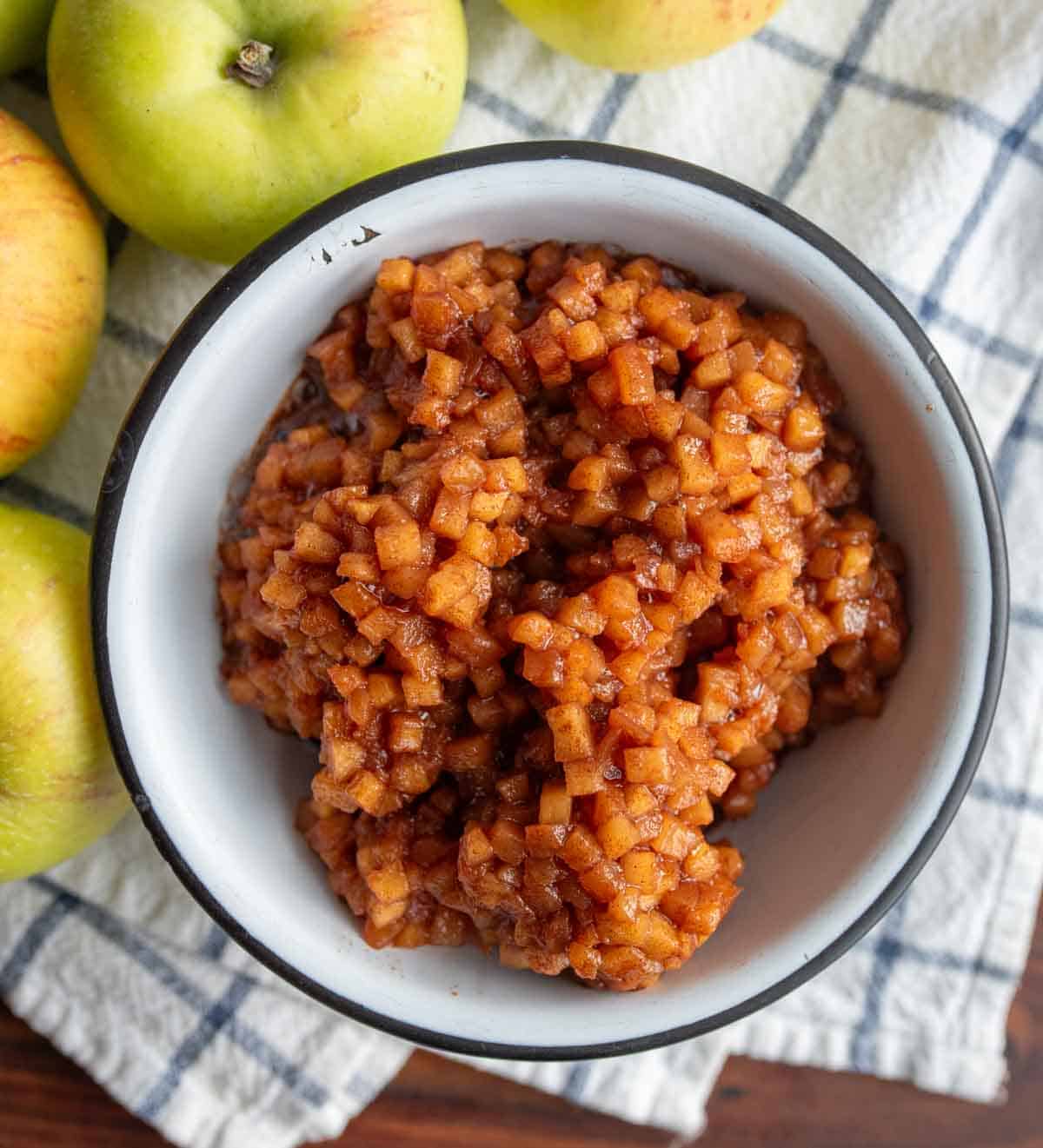 top view of a bowl with small diced apple pie filling