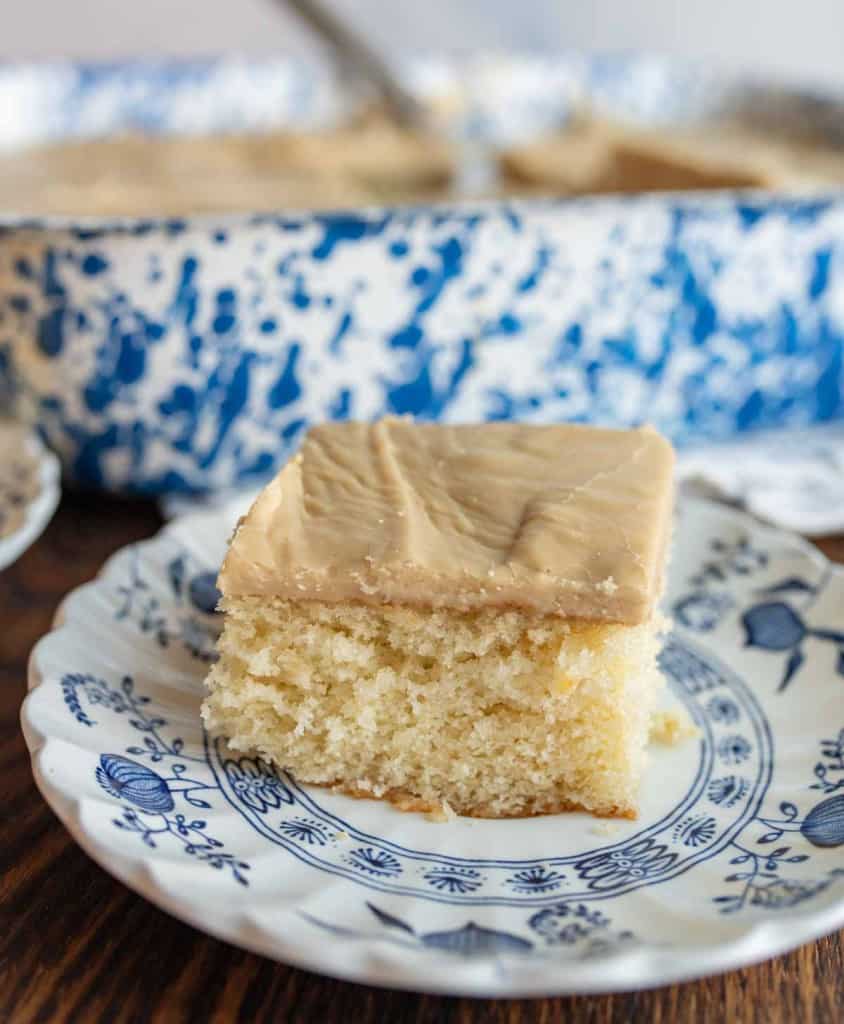 one slice of caramel cake on a plate
