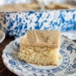 one slice of yellow cake on a plate