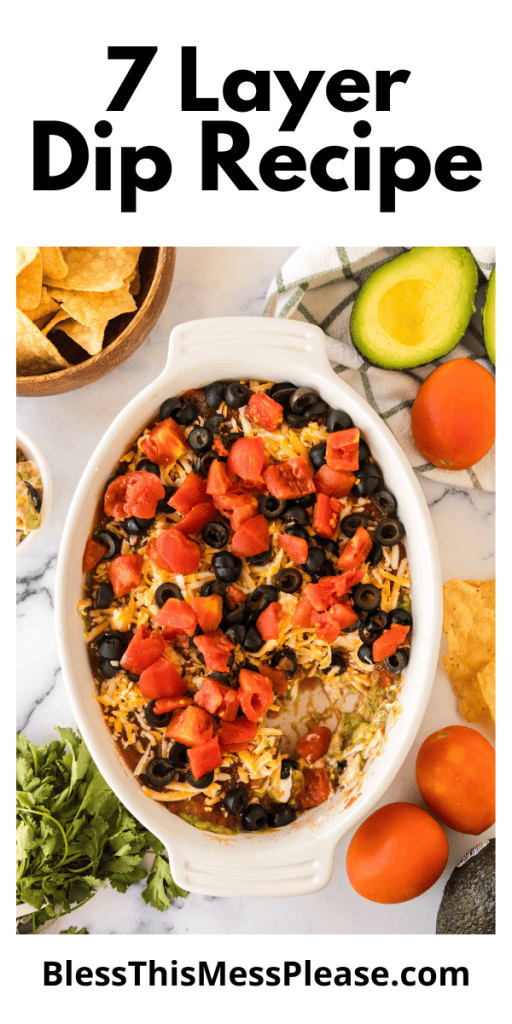 pintrest image with text that reads 7 layer dip recipe with a picture of the dip in a casserole baking dish