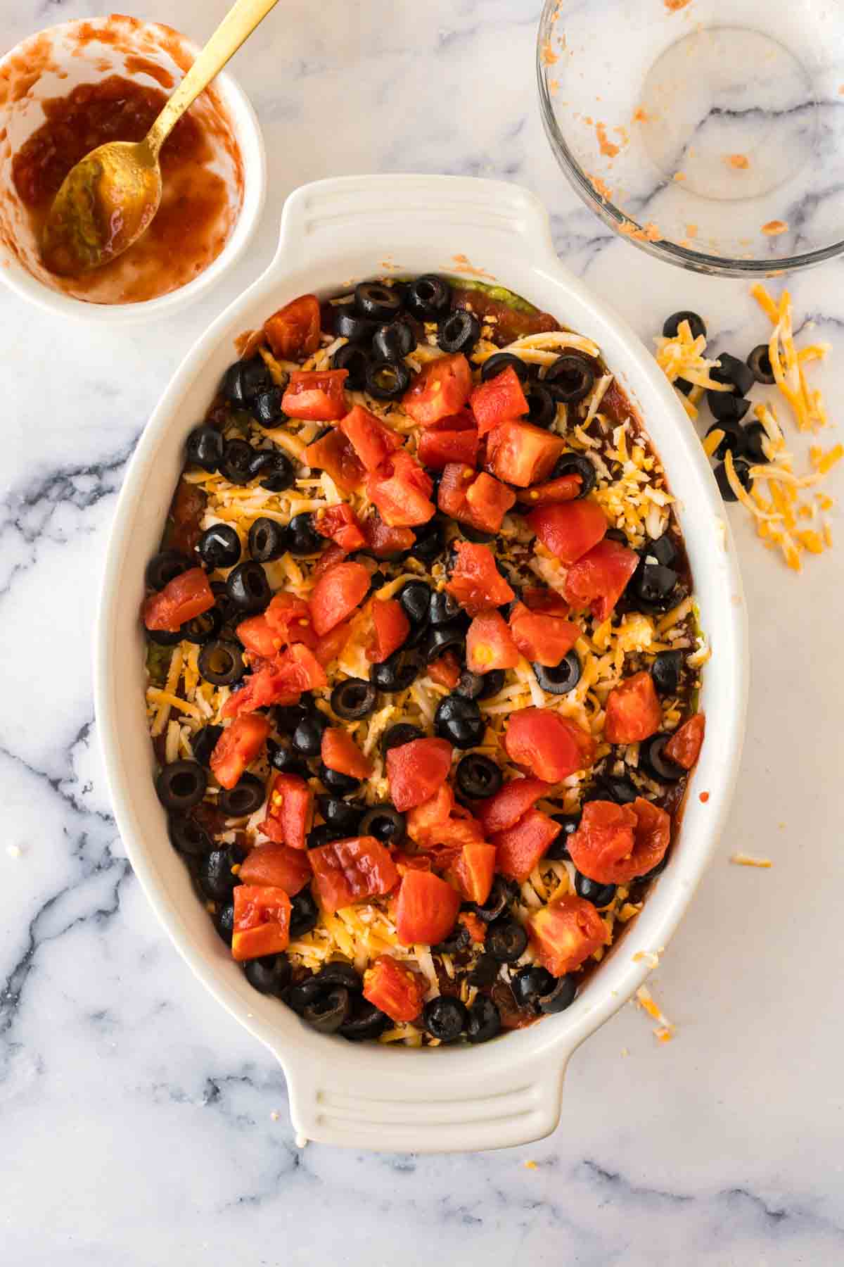 white baking casserole dish with 7 layer dip