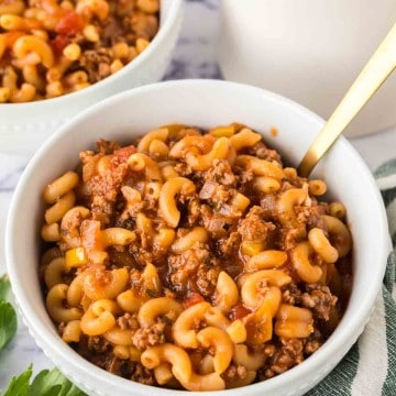 two bowls of American chop suey served and ready to eat