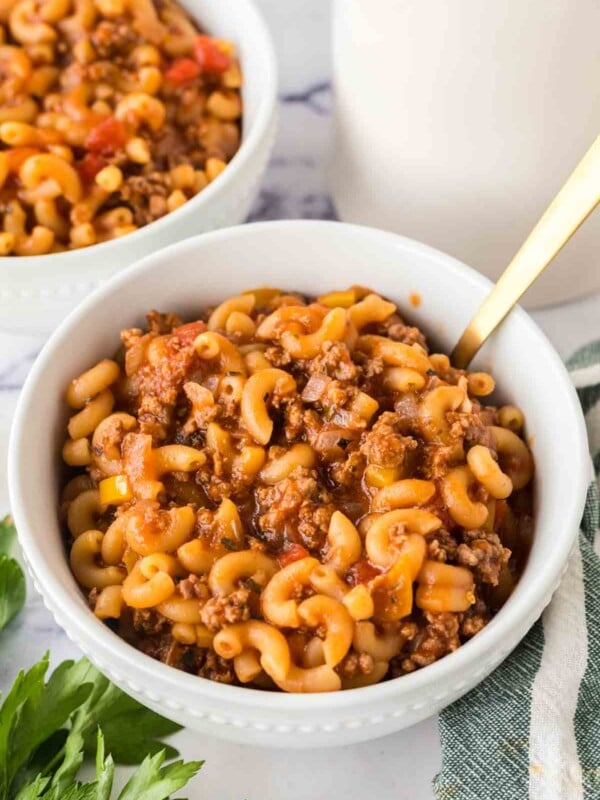 two bowls of American chop suey served and ready to eat