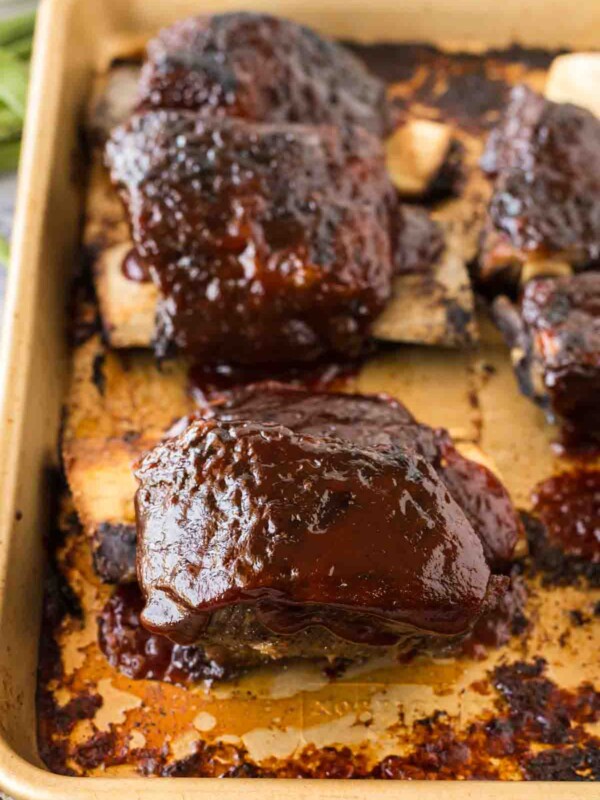 beef short ribs on a baking sheet