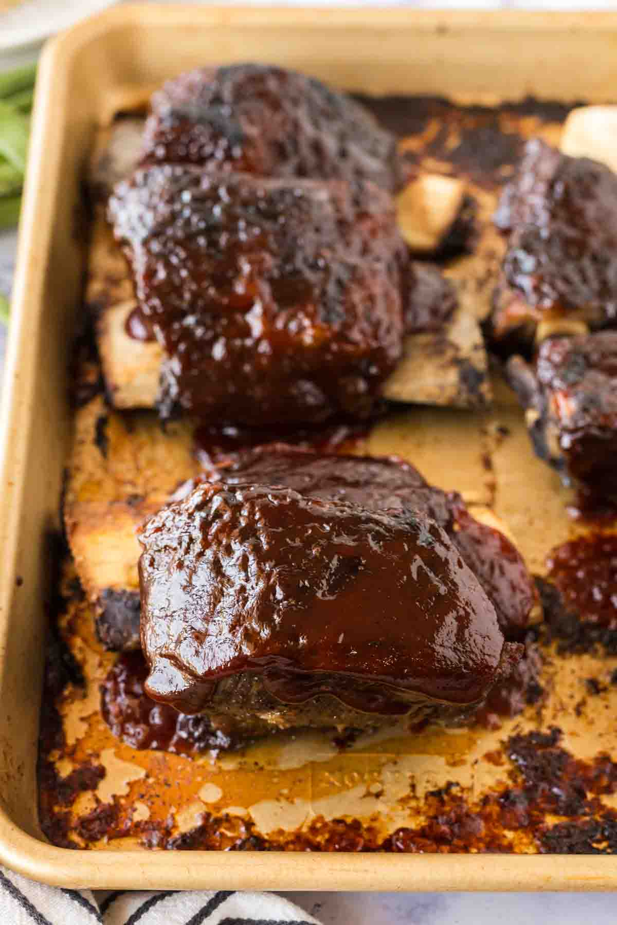beef short ribs on a baking sheet