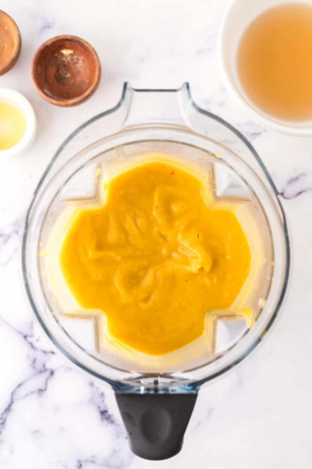 top view of a blender of roasted butternut squash