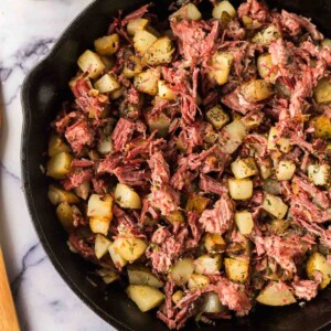 corned beef hash in a cast iron skillet